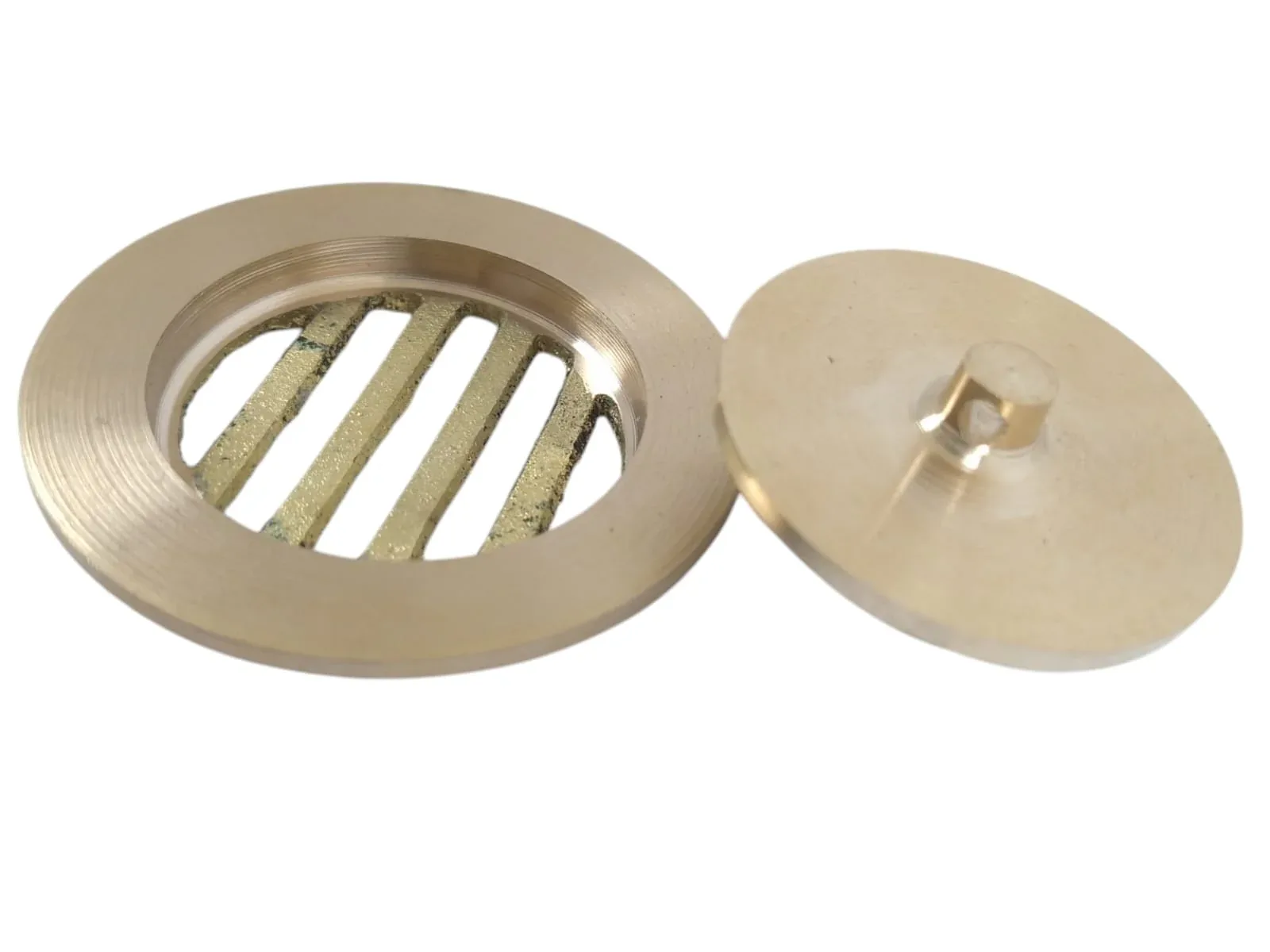 TAPON REJILLA 2" BRONCE